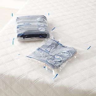 https://images.containerstore.com/catalogimages/393851/10082048-small-travel-vacuum-bag-PVL.jpg?width=312&height=312