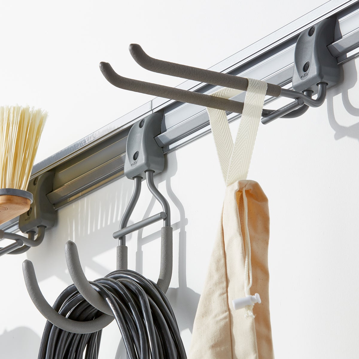 Elfa 4' Utility Storage Track with Five Hooks The Container Store